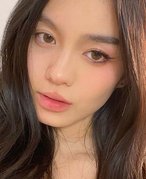 Picture of a person with monolids wearing winged eyeliner