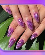 Purple, pink and orange tie-dye collage with a photo of hands with a purple textured chrome manicure