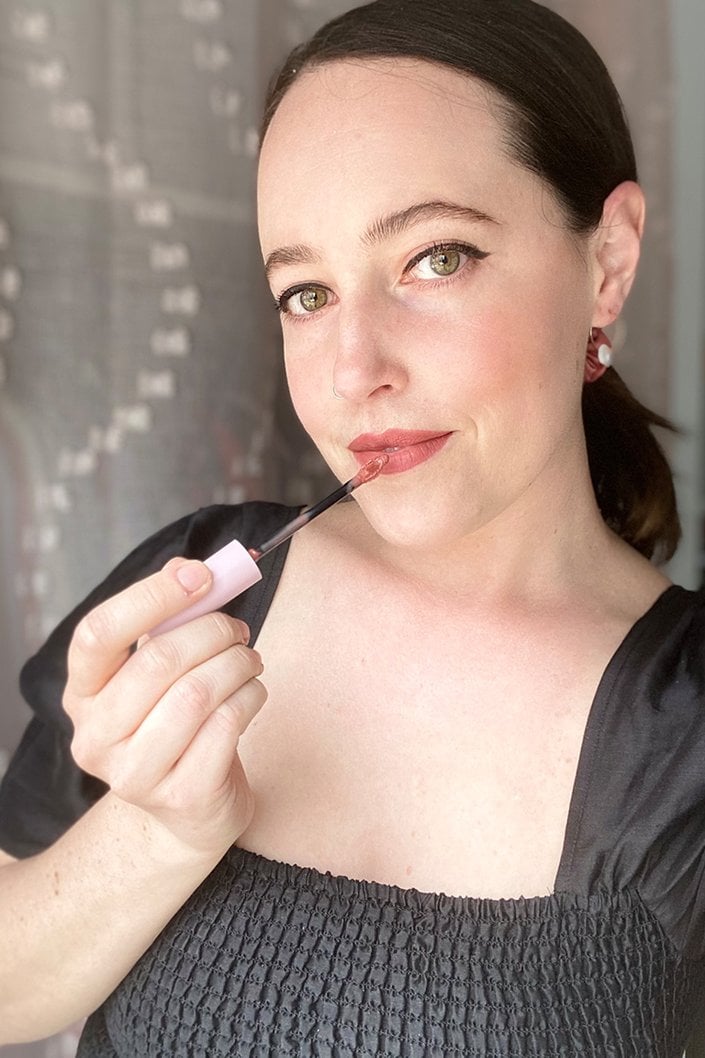 person wearing nyx professional makeup lip lingerie xxl matte liquid lipstick in warm up