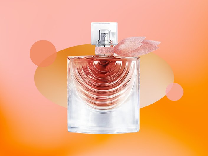 Picture of the Lancôme La Vie Est Belle Iris Absolu Eau de Parfum on a graphic orange background