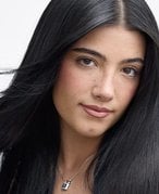 8 Tips For Taming Poofy, Frizzy Hair