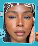 person wearing the siren eyes look with a blue background behind them